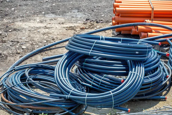 Coiled Black Pvc Hoses Blue Lines Polyethylene Tubing Pipe Material — Stock Photo, Image