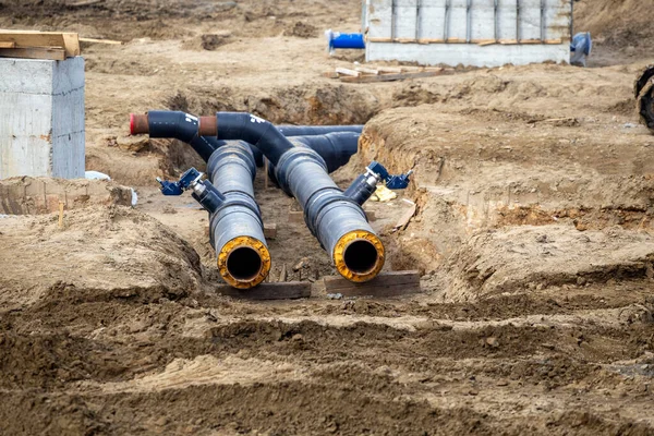New Black Pipes Laying Ground Heat Pipeline Residential Building Construction — Stock Photo, Image