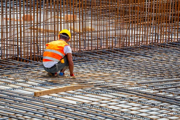 Construction Worker Surrounded Rebar Steel Fixer Tying Steel Reinforcement Cage Royalty Free Stock Photos