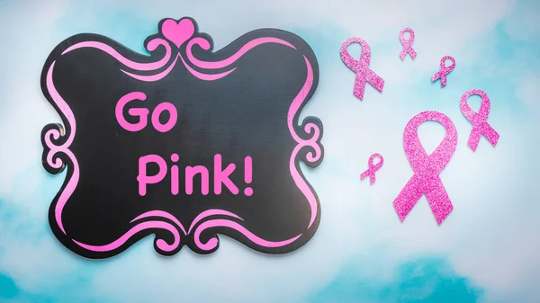 Breast Cancer Awareness ribbons and chalkboard Go Pink.