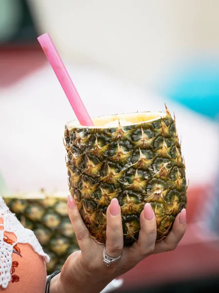 Pineapple Drink held by Pink Nails at food truck event in Sanford, Florida.