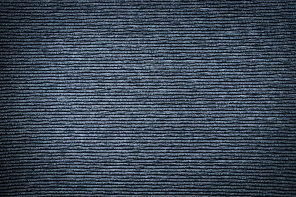 Close-up of black gray plastic material seamless texture. Surface of rough abstract dark black matte background. Design in your work backdrop, concept copy space for text.