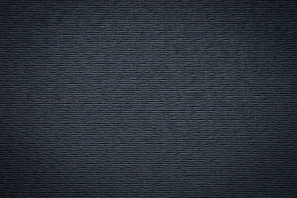 Close-up of Horizontal synthetic black gray leather texture. Surface of rough abstract dark black matte background. Design in your work backdrop, concept copy space for text.