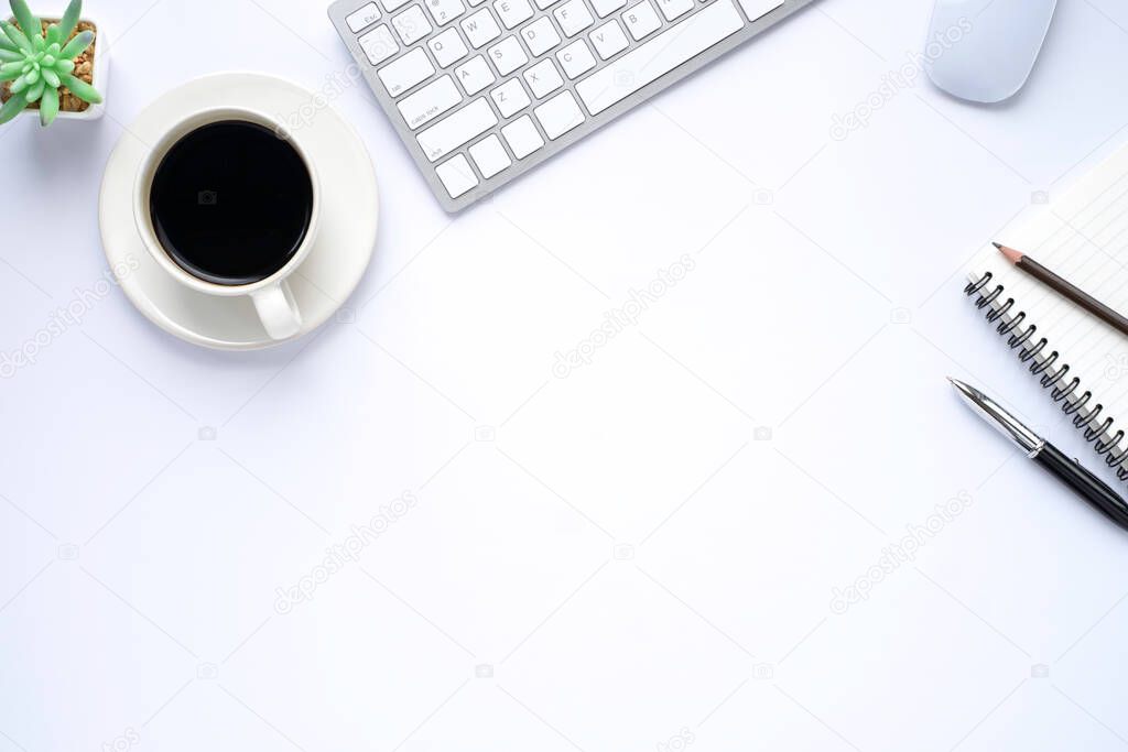 White office desk table with keyboard, notebook and coffee cup with equipment other office supplies. Business and finance concept. Workplace, Flat lay with blank copy space, top view.
