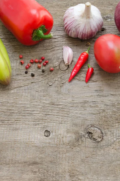 Frame of vegetables: cucumber, tomato, pepper, onion, garlic. Healthy food, Vegan or Harvest concept Copy space composition