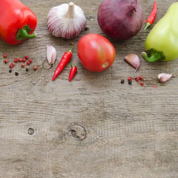 Frame of vegetables: cucumber, tomato, pepper, onion, garlic. Healthy food, Vegan or Harvest concept Copy space composition