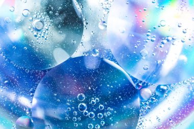 Su soyut arka plan renkli yağ damlaları, suda renkli kabarcık yağı