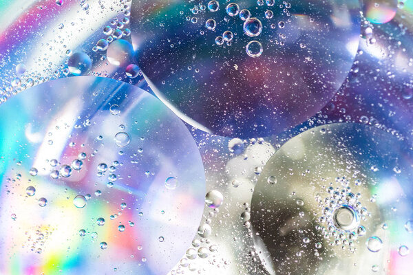 Красочные капли масла в воде Абстрактный фон, красочные пузырьковые масла в воде
