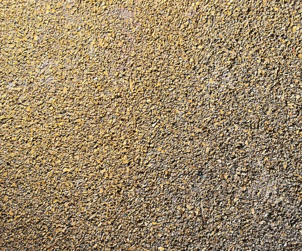 close-up rubber crumb coating. color grainy background texture.