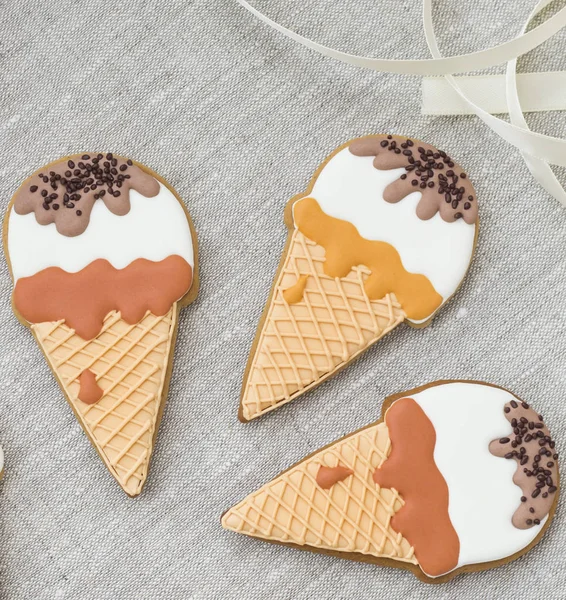 Ice-cream cookies on a plate on a wooden table