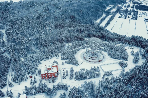 Large satellite dishes, communication technology, radio telescope in frozen Russia landscape