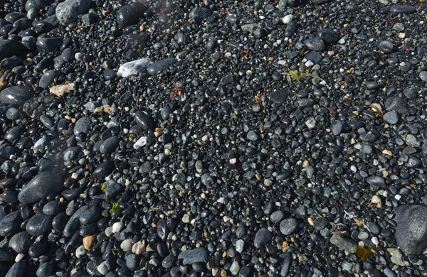黑色沙子与石头的图象 — 图库照片