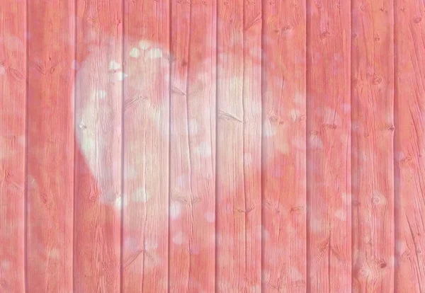 Coração com padrão de textura de corações pequenos no calçadão de madeira — Fotografia de Stock