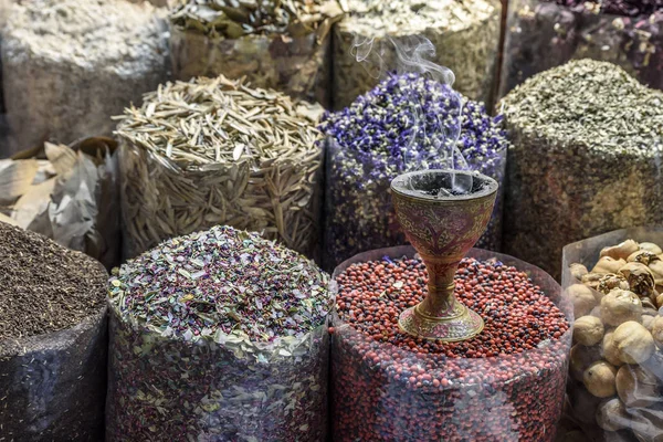 Colorful spices set out in a traditional Arabian Souk. The soul is located in Dubai, in the Middle East
