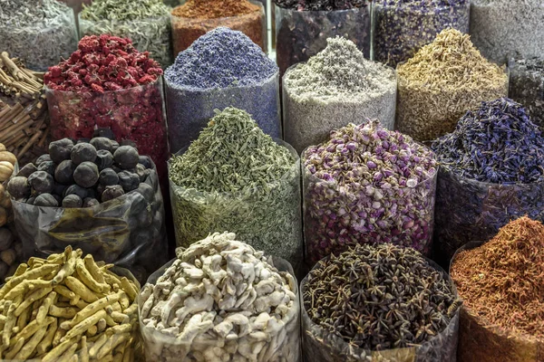 Colorful spices set out in a traditional Arabian Souk. The soul is located in Dubai, in the Middle East