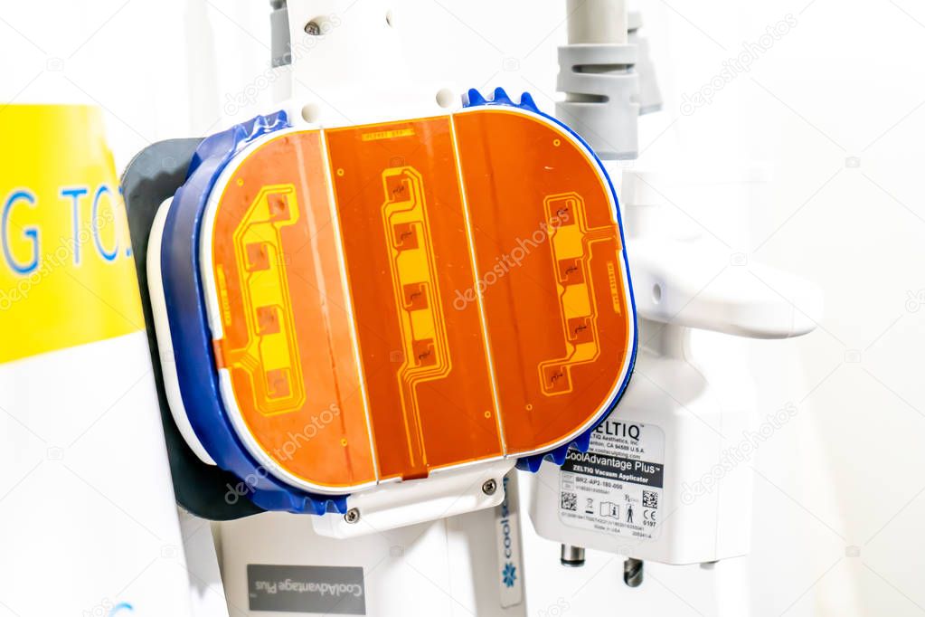 Coolsculpting cryolipolysis fat removal panel in a medspa. Upgraded Coolsculpting applicator.