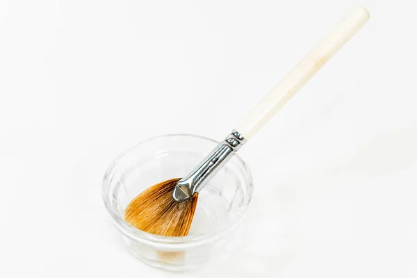 Chemical peel (face peel) liquid ingredient with cosmetic brush, for facial spa treatments by a cosmetologist. Often named a Jessner peel, using acid formulas for complexion and anti-aging treatments. — Stock Photo, Image