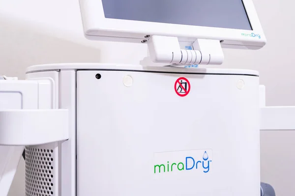 Surrey, BC / Canada - 06/11/19: miraDry axillary hyperhidrosis treatment machine in doctor's office, to deliver microwave technology, to reduce underarm sweat glands and odour glands in the dermis. — Stock Photo, Image