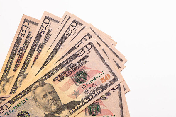 Isolated Heap of fifty 50 US dollars bills background. USA note. Top view. Flat Isolated lay. Business concept. Copy space place for text