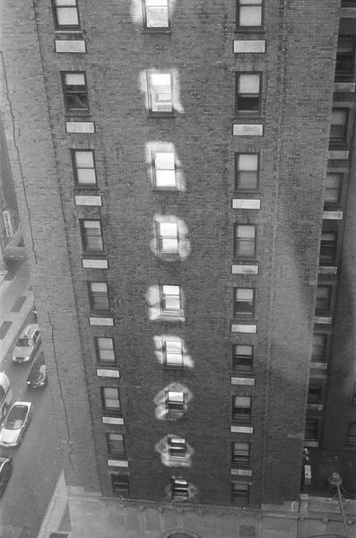 Old bricks building with windows reflection — Stock Photo, Image