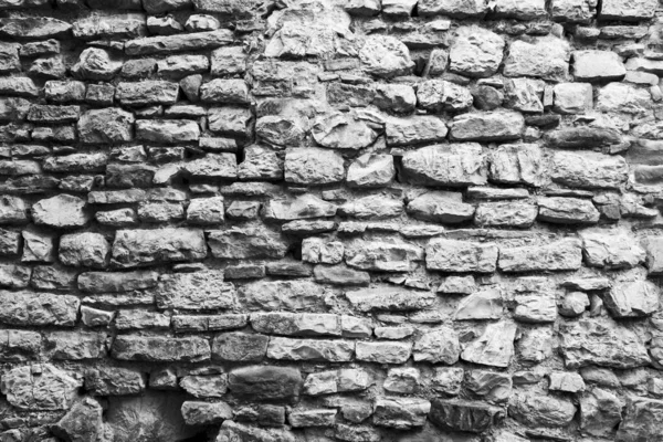 Старая стена с камнями четыре — стоковое фото