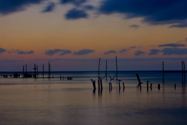 Meksika'da gün batımı ve deniz