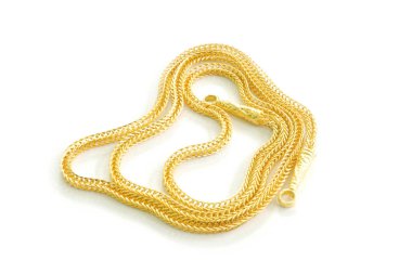 Beyaz bir arka plan üzerine yerleştirilen altın şarkıcı.