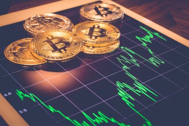 Cryptocurrency, odak Bitcoin ekranda gösterilen yeşil Fiyat veya borsa performans grafiği, hafif tablet vintage filtresiyle yansıtır. Adem-i merkeziyetçi, blockchain üzerinden exchange dijital para.