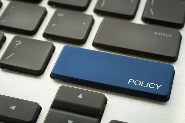 Fechar Botão Azul Teclado Laptop Foco Seletivo Palavra Política Visão — Fotografia de Stock