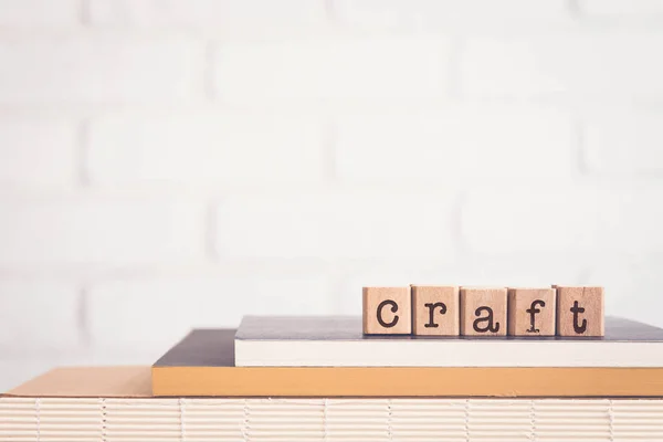 Word Craft Letters Block Cubes Top Books Wooden Table White — Stock Photo, Image