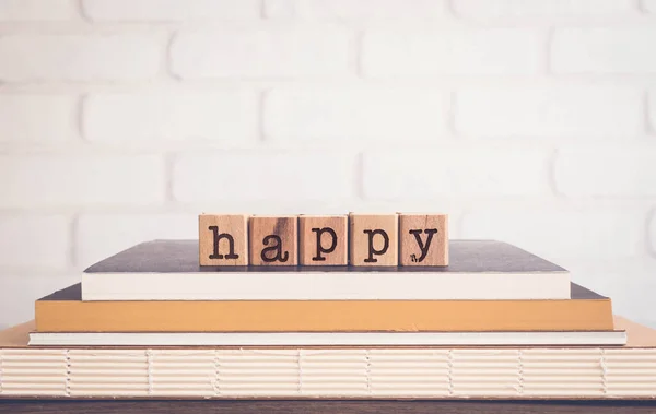 Letters Word Happy Block Cubes Top Books Wooden Table White — Stock Photo, Image