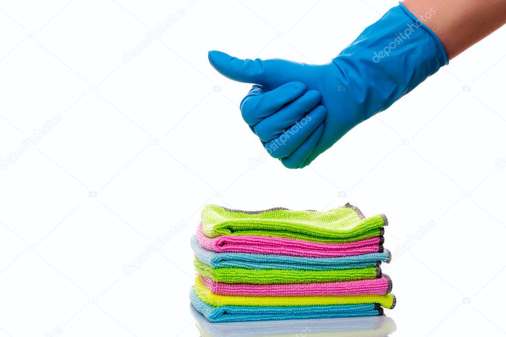 approval of the selected material for cleaning, hands in blue gloves