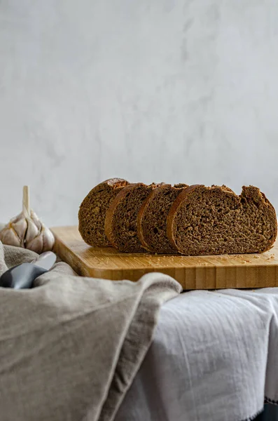 Sliced Pieces Bread Lying Wooden Board Table Cloth — Stock Photo, Image