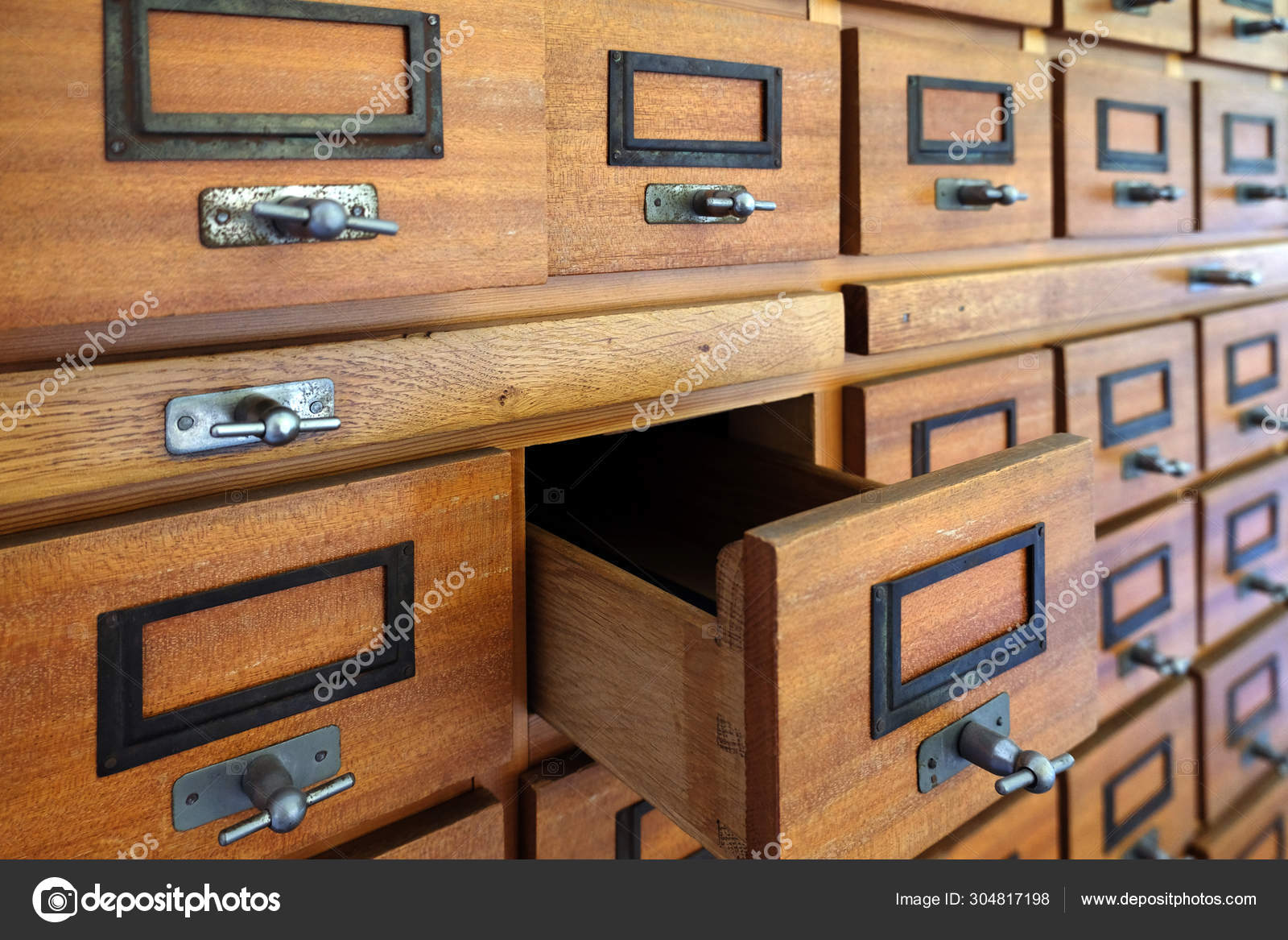 Vintage Filing Cabinet Made Of Wood With One Drawer Open Stock