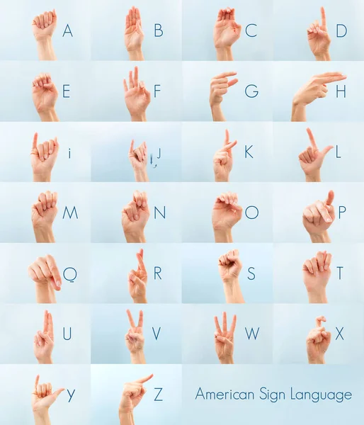 American sign language . Female hand showing alphabet isolated on blue background.