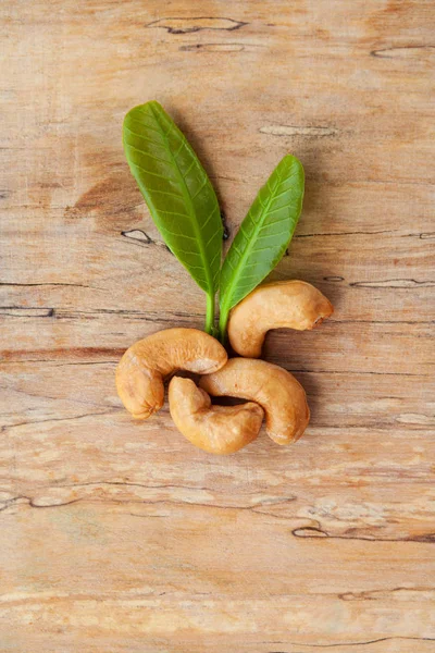 Cashew Nuts Leaves Wooden Table — Stock Photo, Image