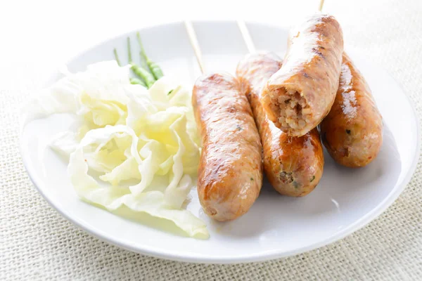 Tay Baharatlı Sosis, çeşitli karışık kıyılmış domuz eti yapılmış 