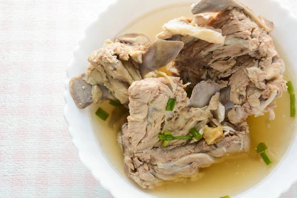 Slow Cooker Pork Bone Broth, it 's simmered for many hours to ext — стоковое фото