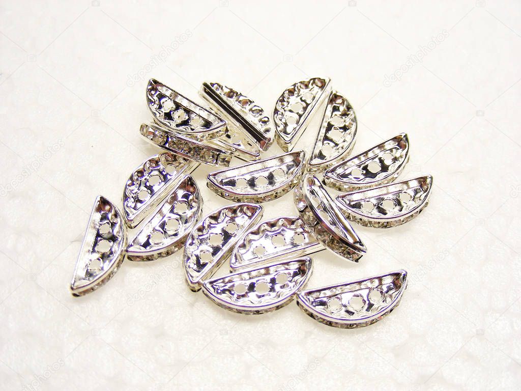 Shiny sparkling diamond rhinestones on a white background. Fashi