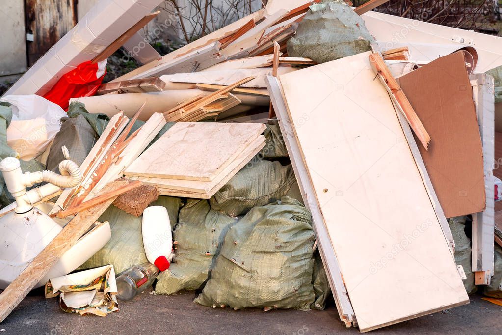 A pile of trash, garbage and old furniture submitted for disposal in the trash