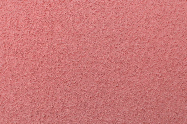 Powierzchnia tynkowane ściany malowane w kolorze koralowym-modny kolor 2019 rok — Zdjęcie stockowe