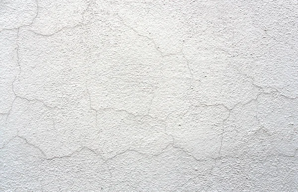 Antiguo fondo de pared agrietada blanca Textura de estuco — Foto de Stock