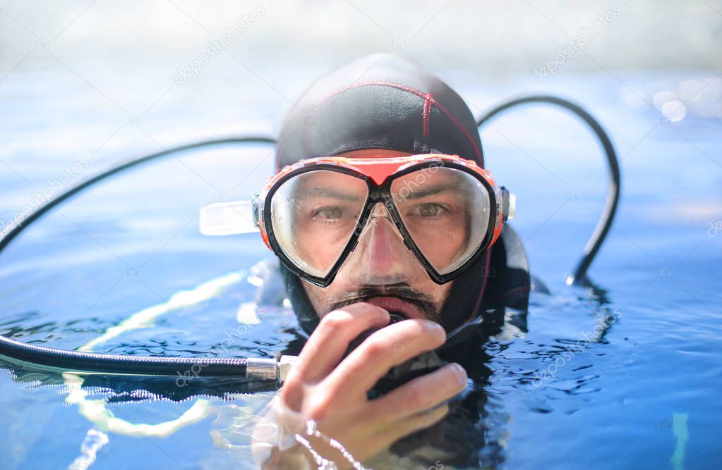 Scusa diver ready to dive in the sea