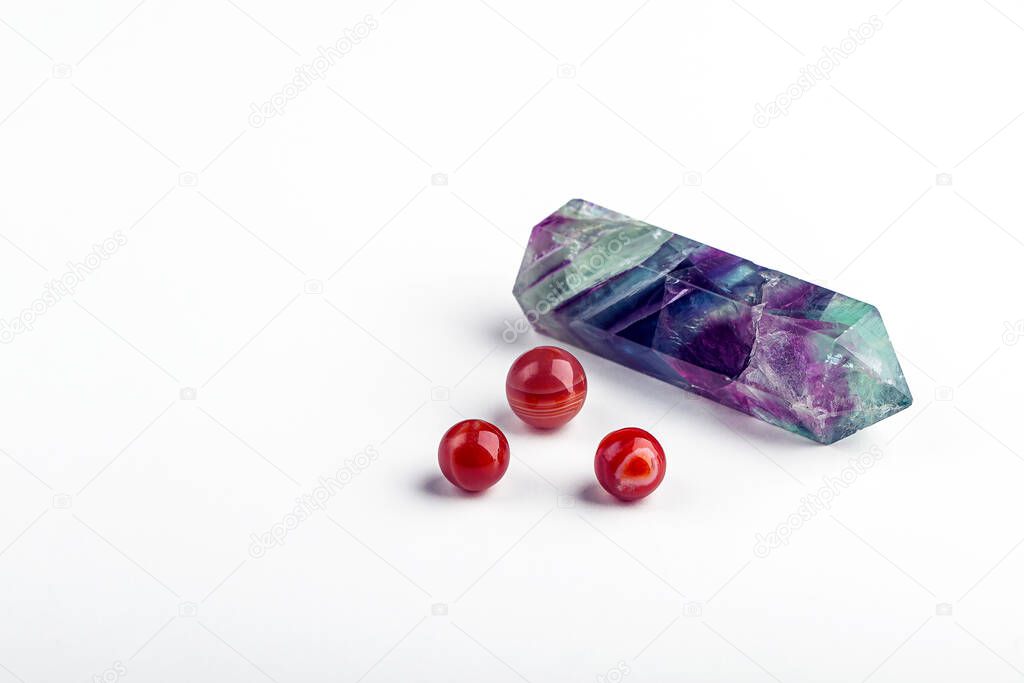 Set of gemstones fluorite crystal and carnelian. Magic rock for mystic ritual, witchcraft and spiritual practice. Natural stones to attract love and energy. Copy space for text