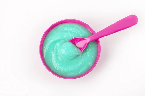 Homemade hair dye or blue mask for face and body in bowl (face cream). Natural organic homemade cosmetics concept