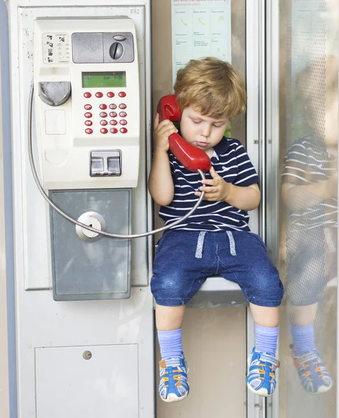 Baby Talking Landline Phone Boy Telephone Booth Red Handset — Stock Photo, Image