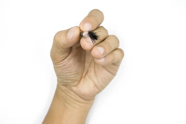 Un maschio mano tenendo piccolo rossore, ansimando arrossire, uomo mano isolata — Foto Stock