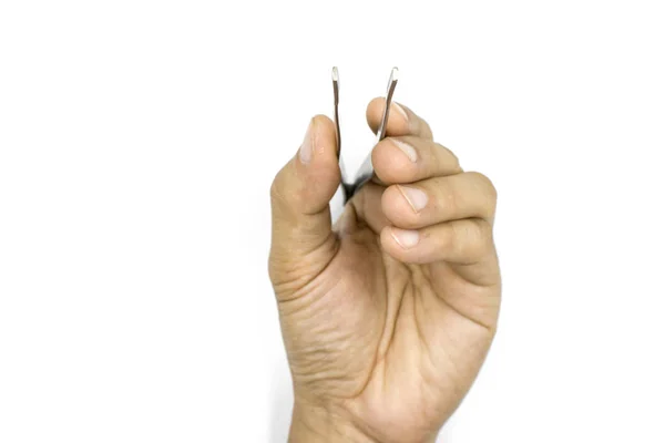 A male hand holding Tweezers, medical pinsetter, man hand  isola — Stock Photo, Image