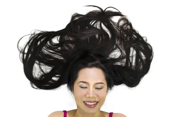 Closeup portrait of happy asian women  lying on ground with blac — Stock Photo, Image