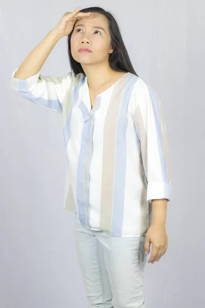 Businesswoman wearing shirt posing smile thinking isolated on gr — Stock Photo, Image